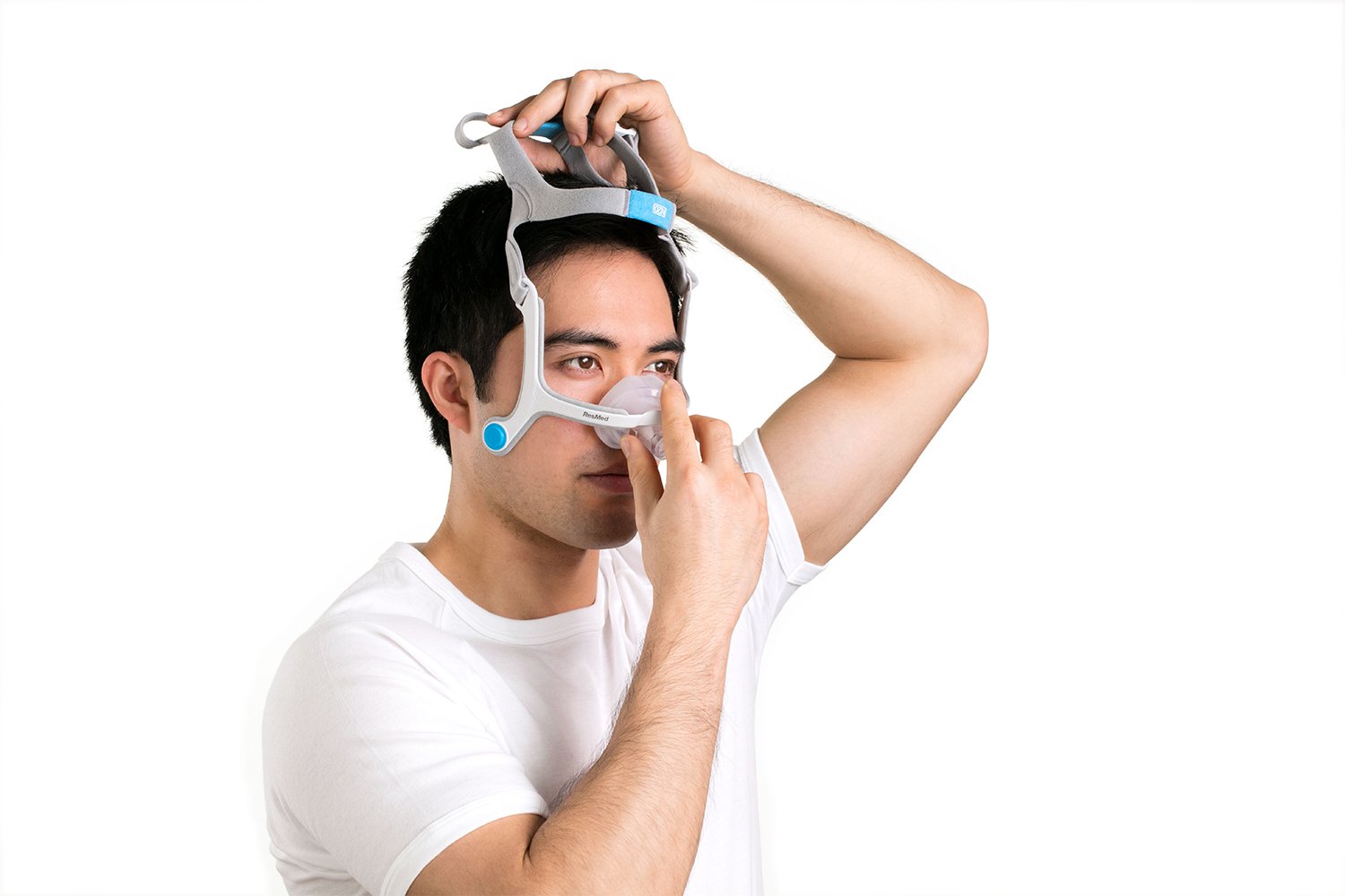 Man Trying on N20 Nasal Mask